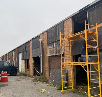 the facade of a commercial building in Queens, NY that was in need of commercial waterproofing services