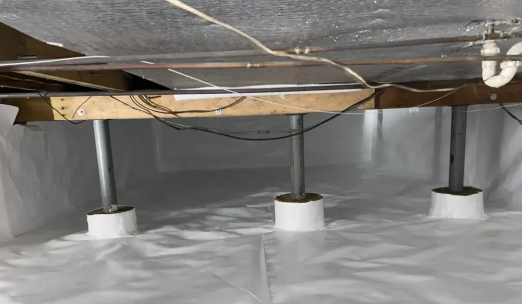 A crawl space that has been waterproofed and encapsulated by the waterproofing experts NY team in Brooklyn