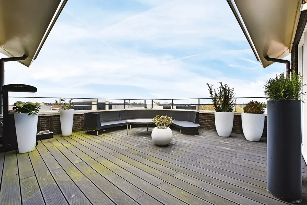 A beautiful roof top deck that has weathered pavers because of lack of waterproofing in Brooklyn NY