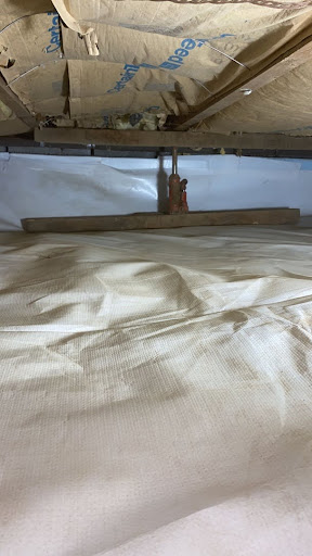 A vapor barrier installed on a crawl space in Long Island